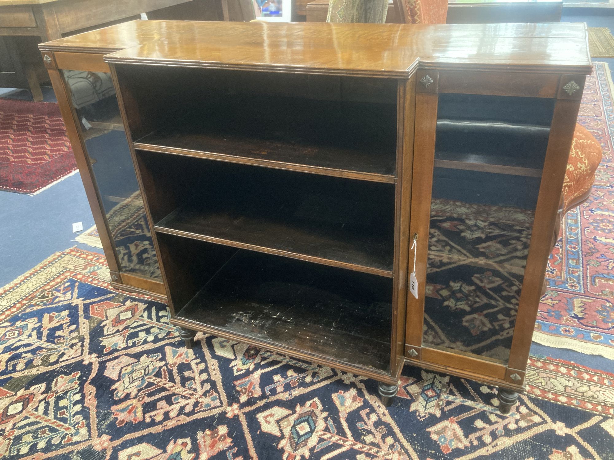 A Regency style mahogany and satinwood dwarf breakfront bookcase, length 112cm, depth 42cm, height 78cm